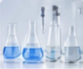 Laboratory glassware with blue liquid